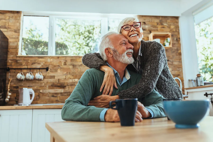 Retired couple reviewing income plan
